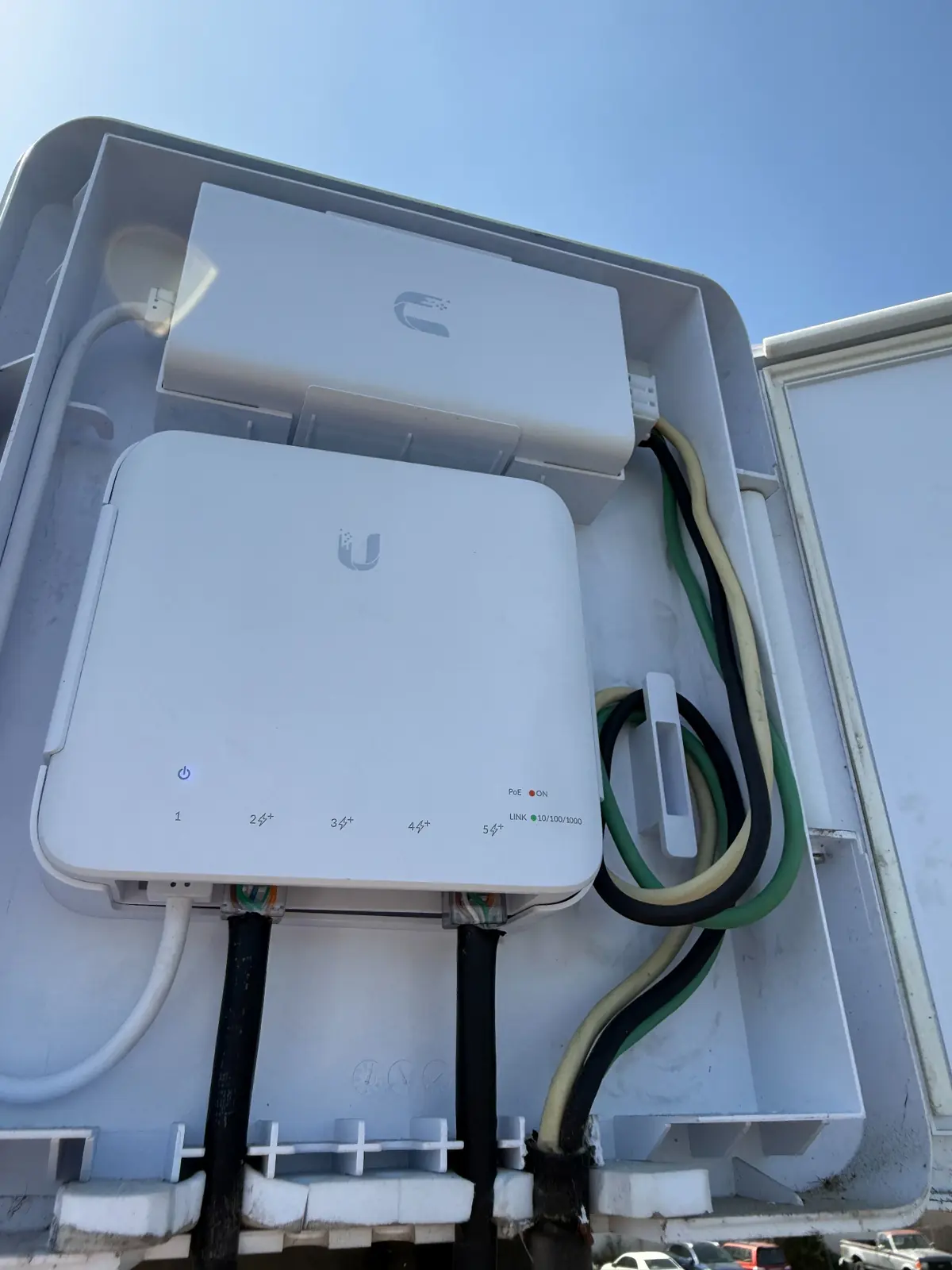 Weather-protected outdoor network enclosure